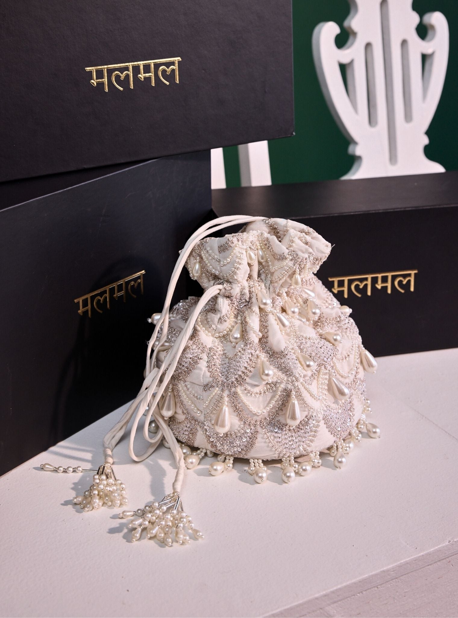 Mulmul Tamanna White Silver Potli Bag