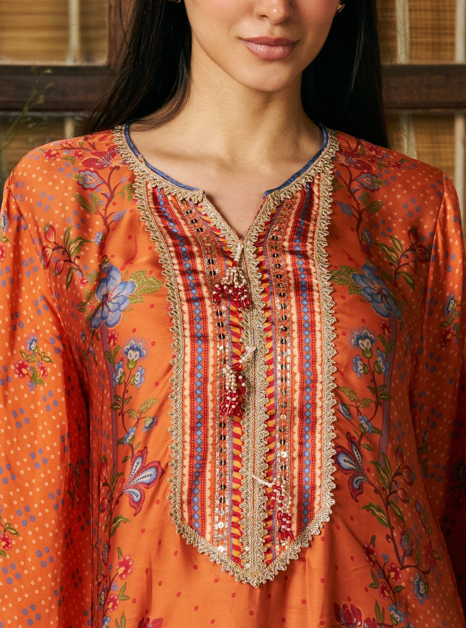 Akshi Cupro Satin Printed Orange Kurta Set