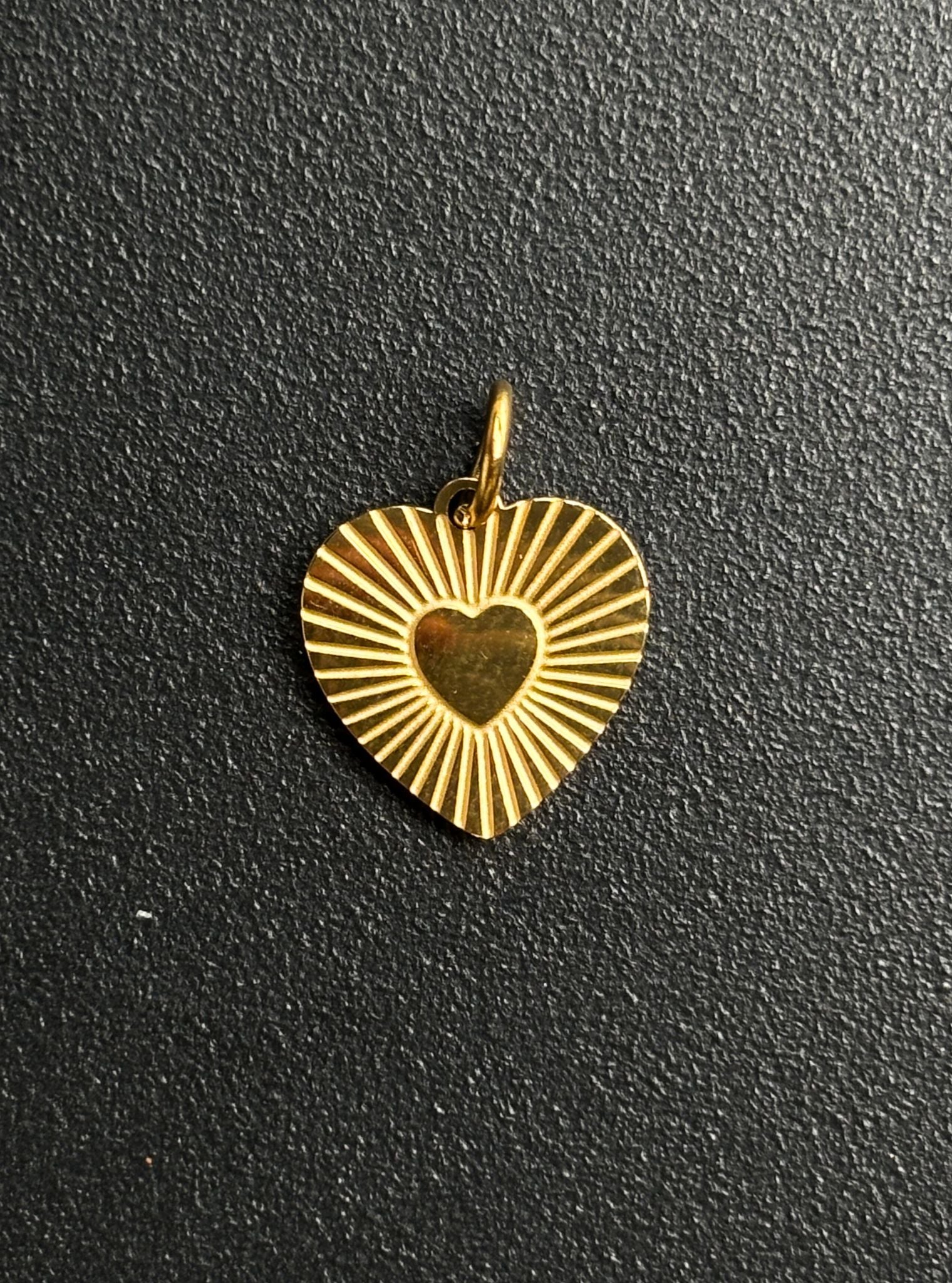 Radiant Heart Charm